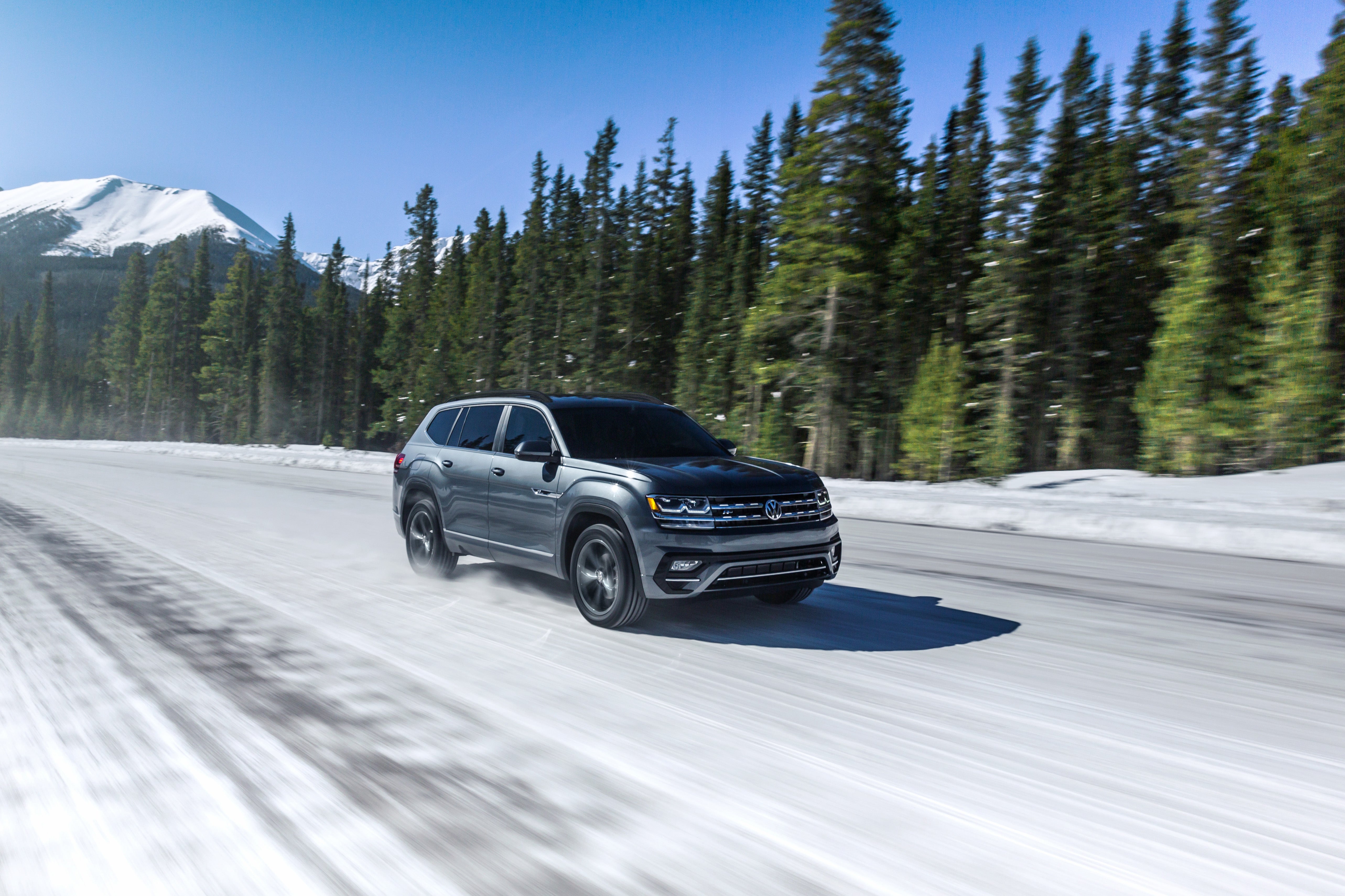 VW SUV driving in the snow